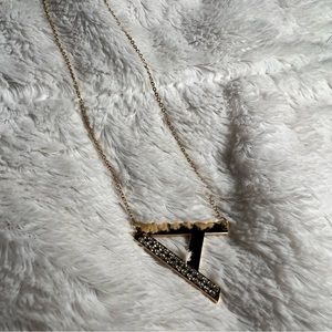 Gold letter A necklace with little diamonds
